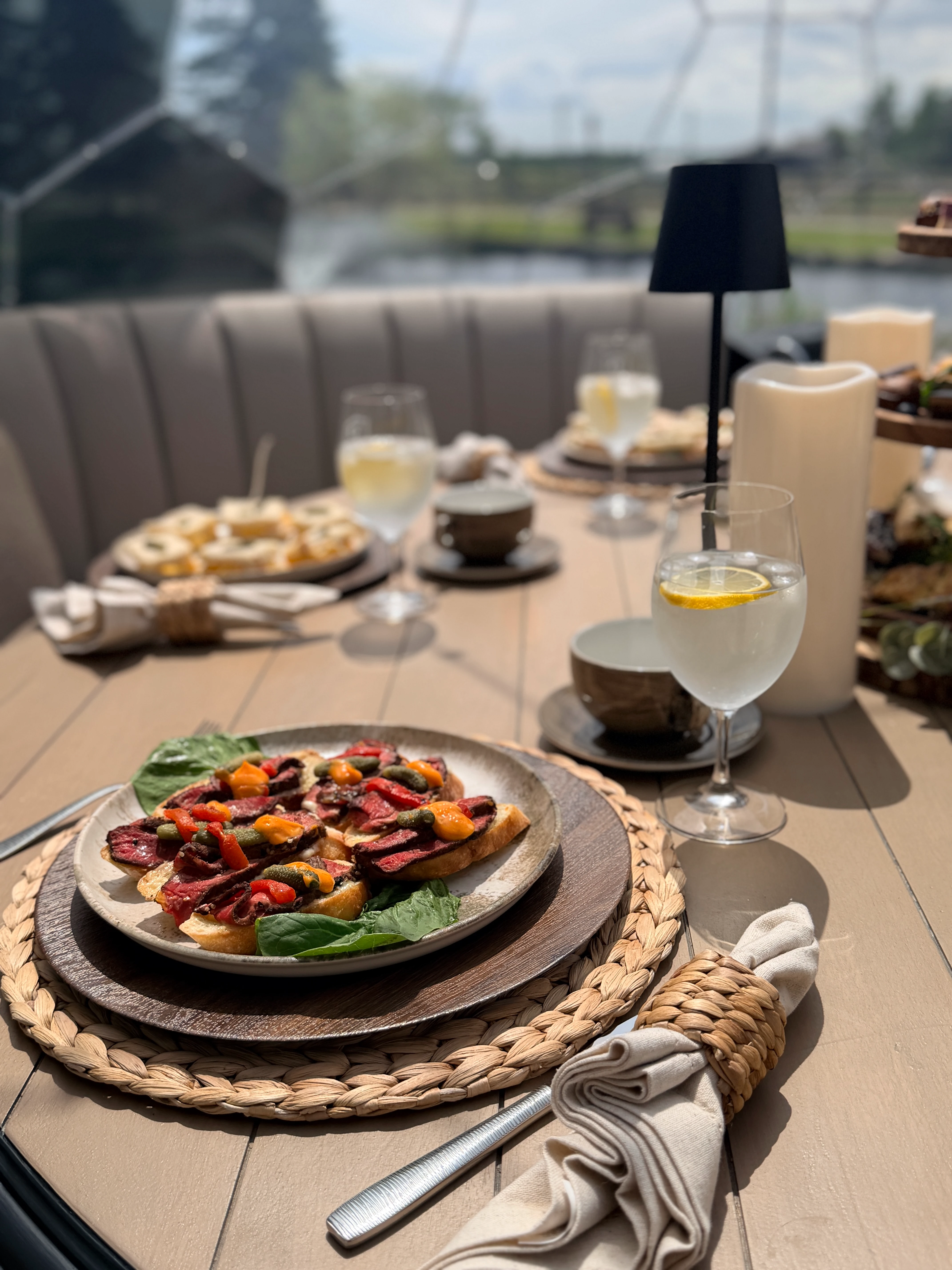 Curated tasting spread with charcuterie and a mocktail